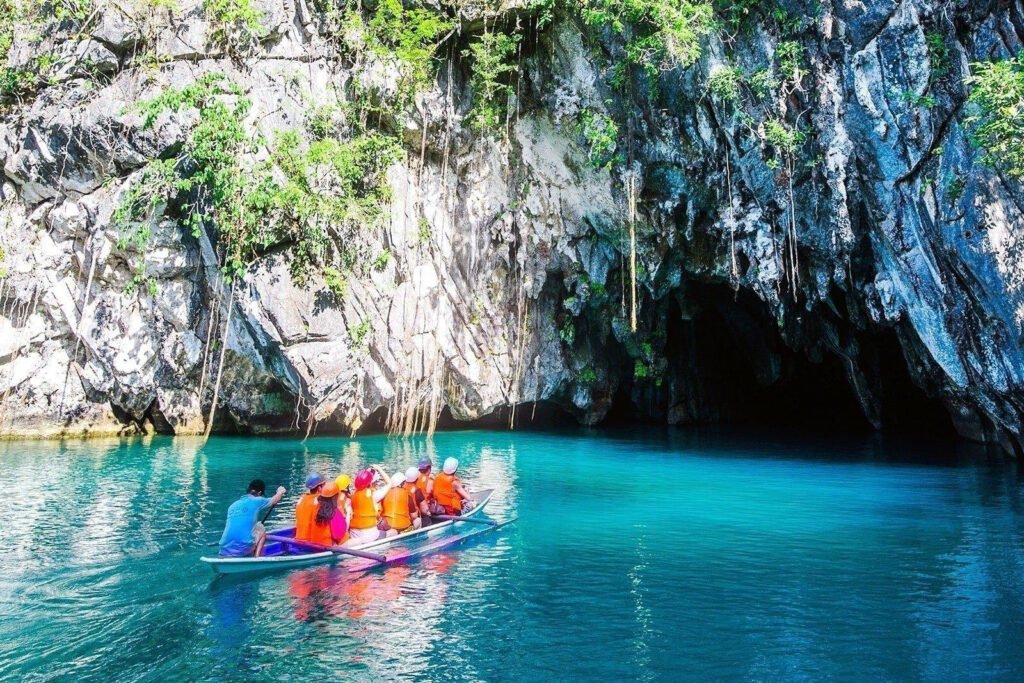 Boat traveling through the Puerto Princesa Underground River in Palawan