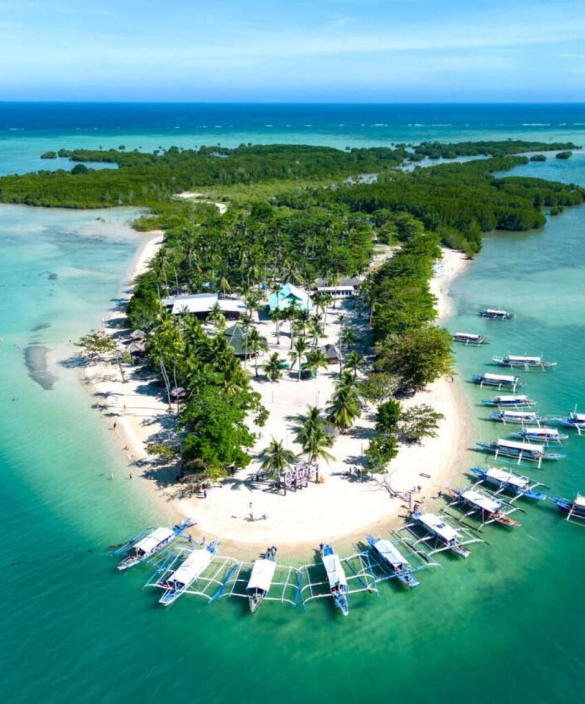 Tropical islands and clear blue water during a Honda Bay island hopping trip