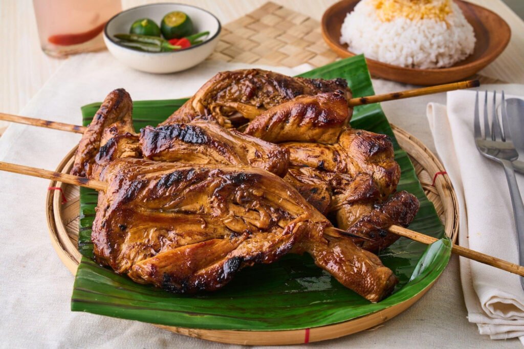 Filipino chicken inasal served with rice, a popular grilled chicken dish
