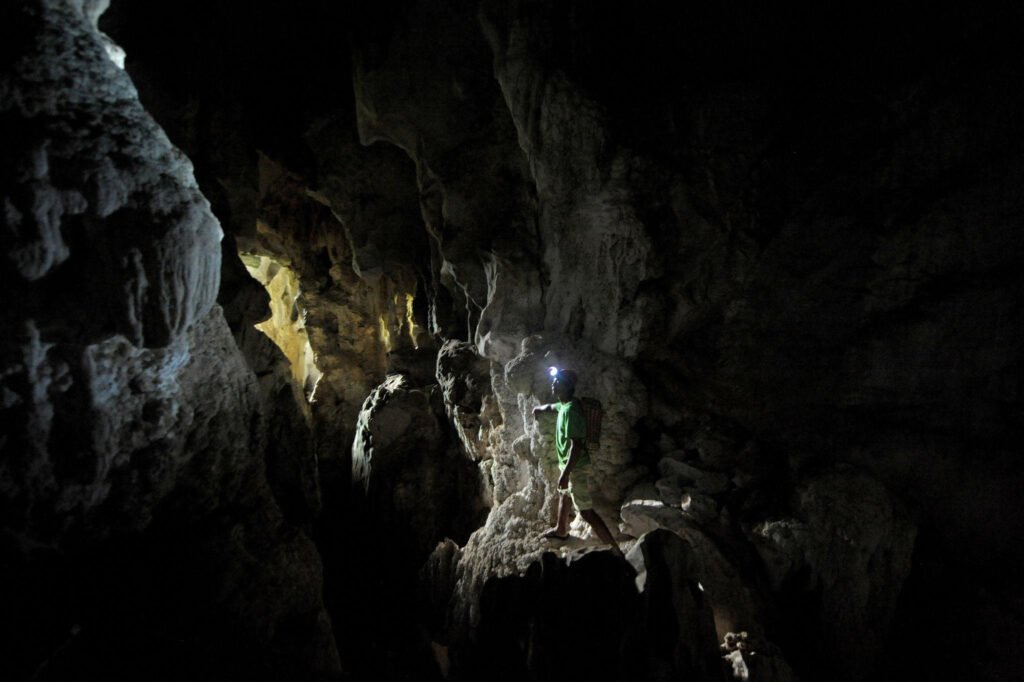 Limestone rock formation and surrounding landscape at Ugong Rock in Palawan