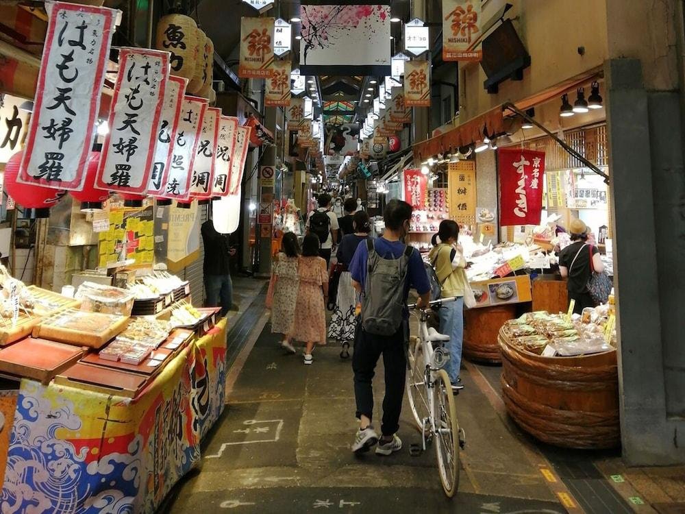 Traditional food stalls inside Nishiki Market in Kyoto Japan
