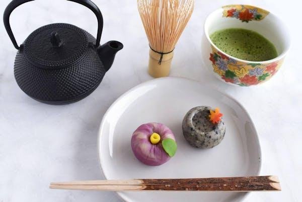 Traditional Japanese matcha tea served with wagashi sweets in Kyoto