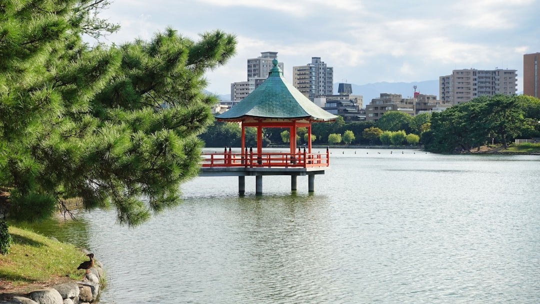 Ohori Park lake, pavilion and Fukuoka city skyline