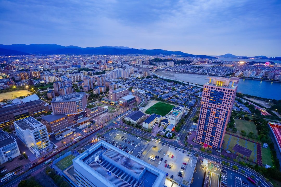 Blue-hour Fukuoka city view from Fukuoka Tower toward the Sefuri mountains