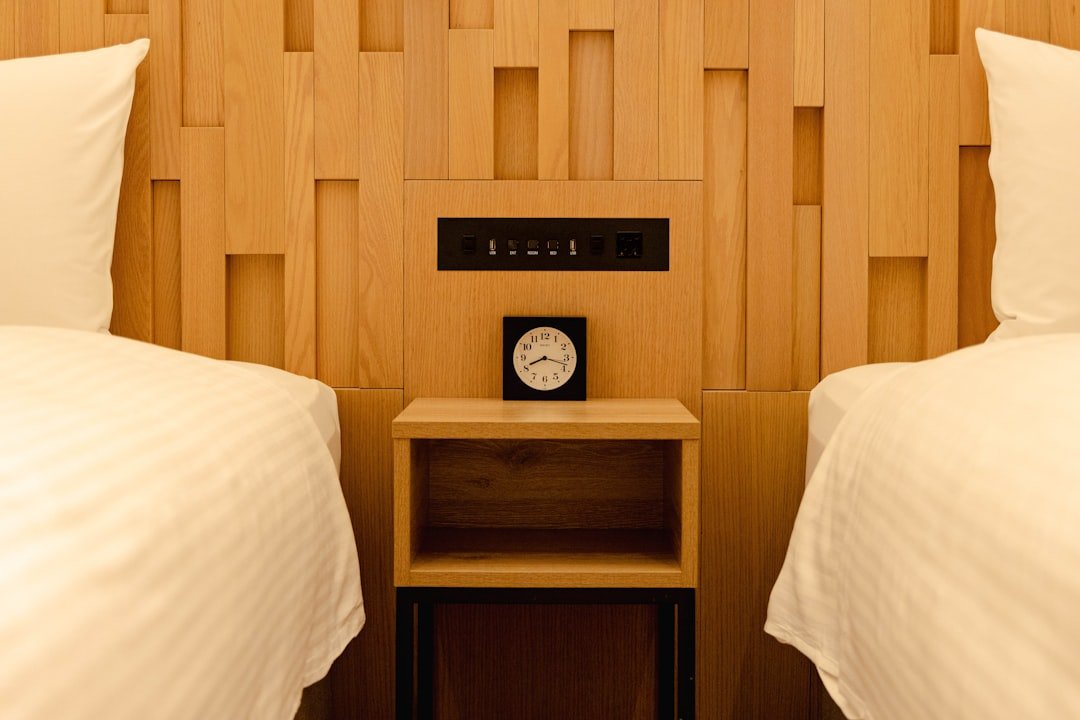 Illustrative practical twin hotel room for budget-conscious Fukuoka travelers