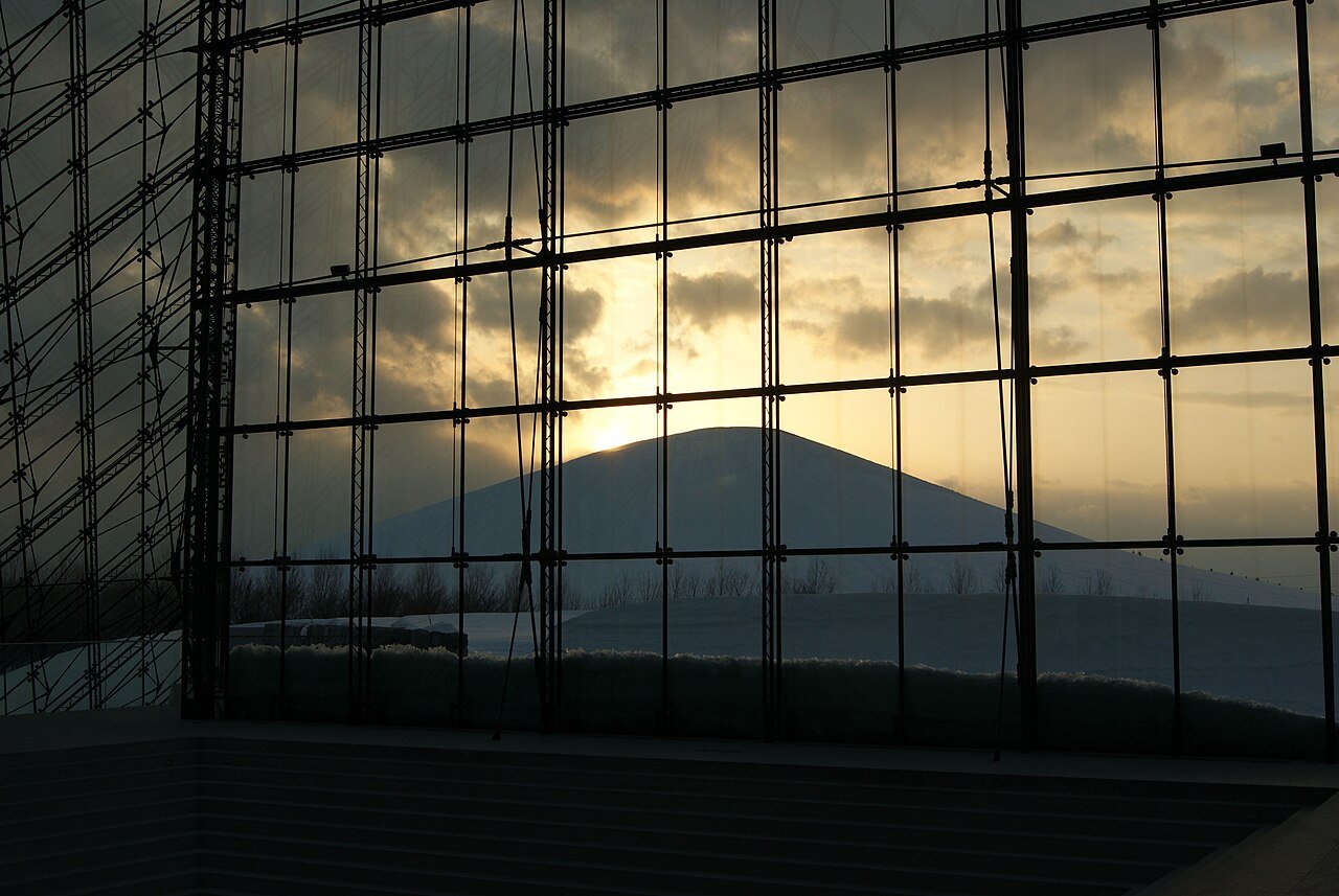 Glass Pyramid interior at Moerenuma Park framing the surrounding landscape.