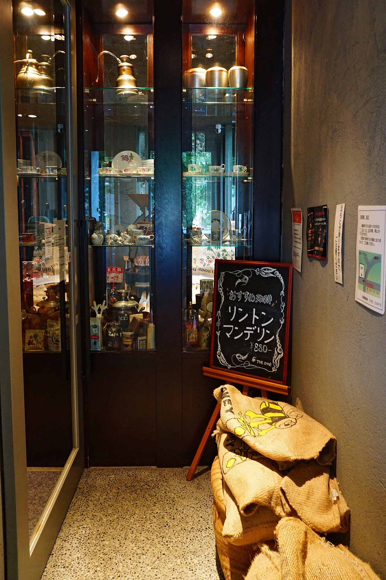 Entrance detail at Miyakoshiya Coffee THE CAFE in Sapporo, photographed in 2022.
