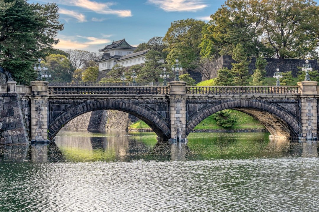 Stone Nijubashi bridge and Imperial Palace grounds in Tokyo