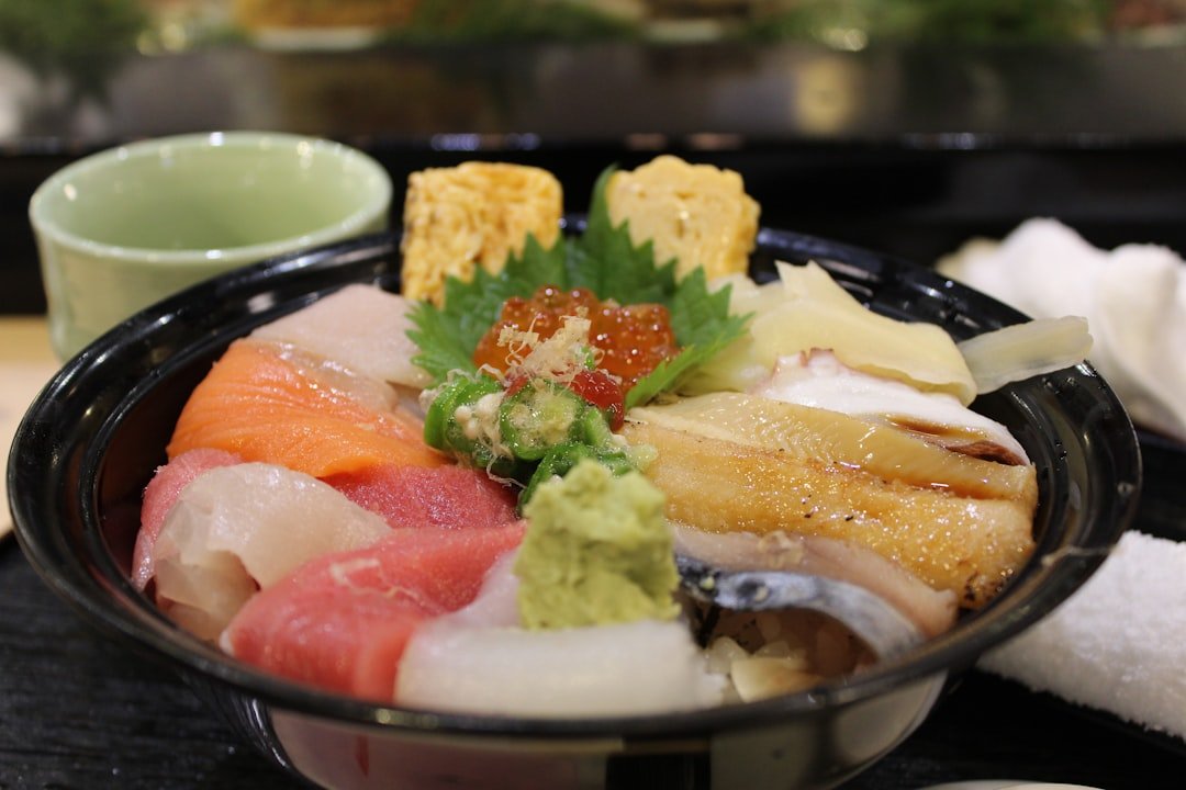 Illustrative Tokyo chirashi sushi bowl with assorted seafood