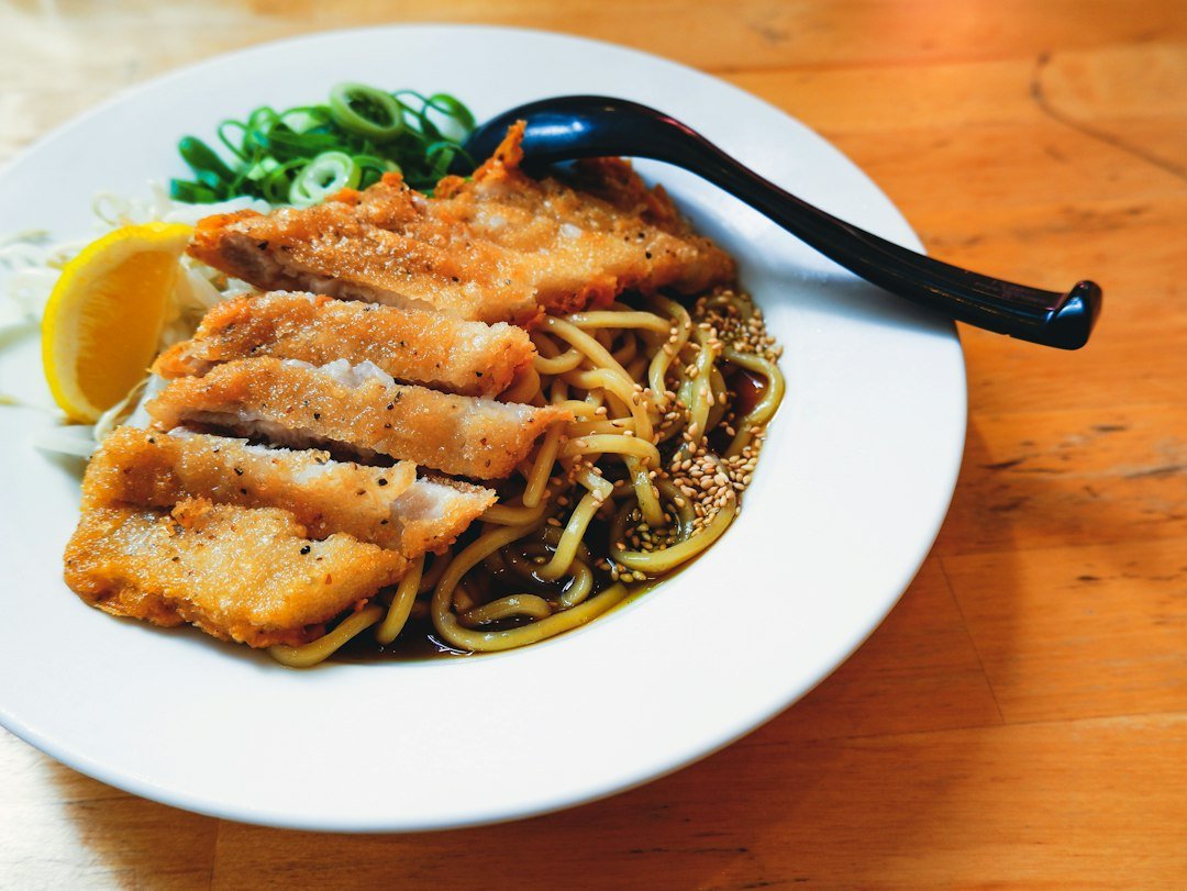 Illustrative Tokyo tsukemen noodles served with pork and sesame